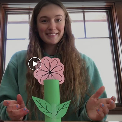 Teen with toilet paper roll flower art project