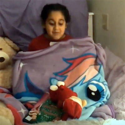 Girl Cozy in Bed with Blanket