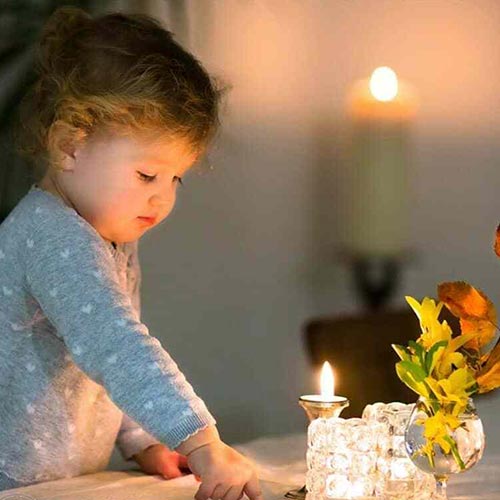 little girl and candles